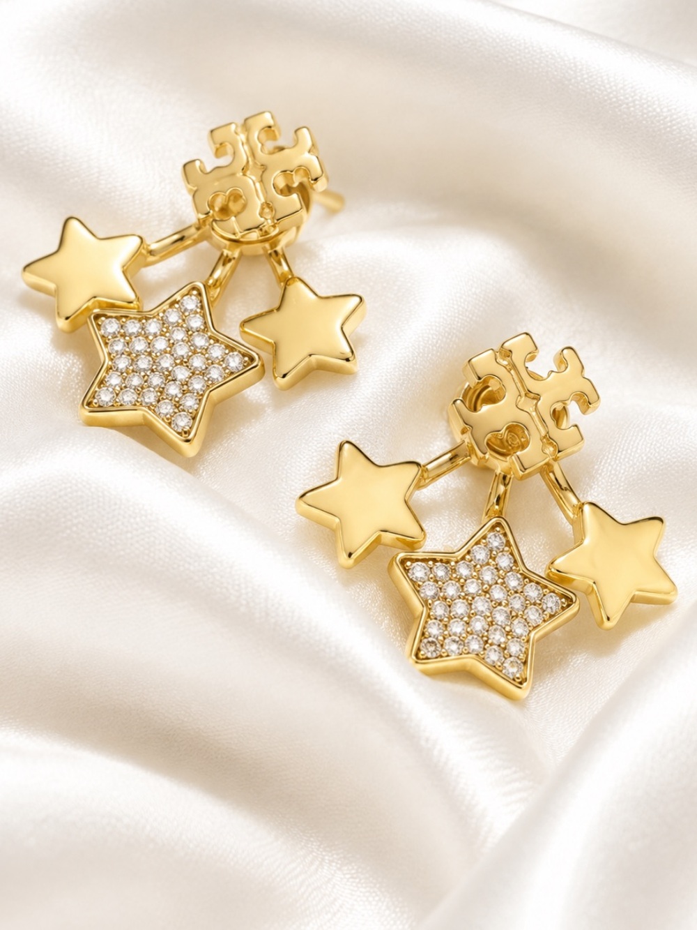 Tory Burch Shooting Gold Star Drop Earrings with Pave Crystals.